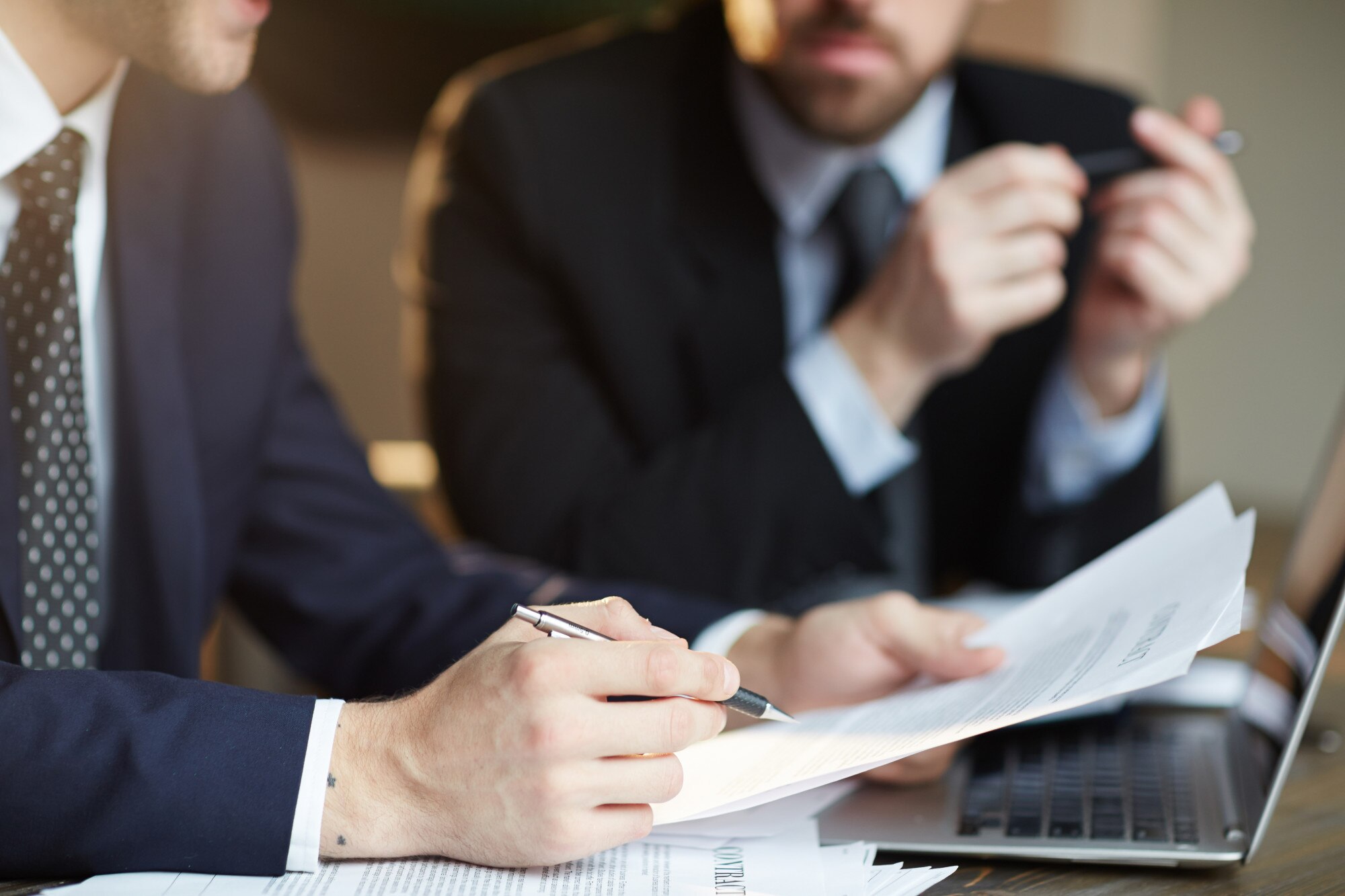successful business partners discussing contract 1098 14790